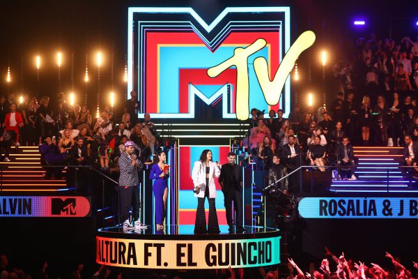 SEVILLE, SPAIN - NOVEMBER 03: Rosalia accepts the Best Collaboration Award on stage from El Guincho on stage during the MTV EMAs 2019 at FIBES Conference and Exhibition Centre on November 03, 2019 in Seville, Spain. (Photo by Tim P. Whitby/Getty Images for MTV)